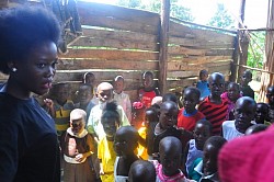 Teacher and children, Kampala, Uganda