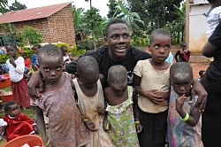 Man with children, Kampala, Uganda, Africa
