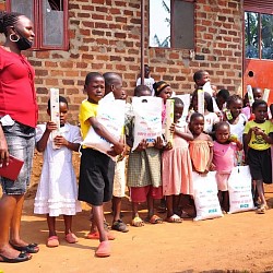 Families receive the donations of rice