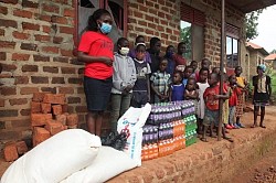 Children waiting patiently for their gift of food and drink