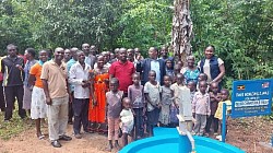 Community comes out for bore well dedication. Near Kampala Uganda